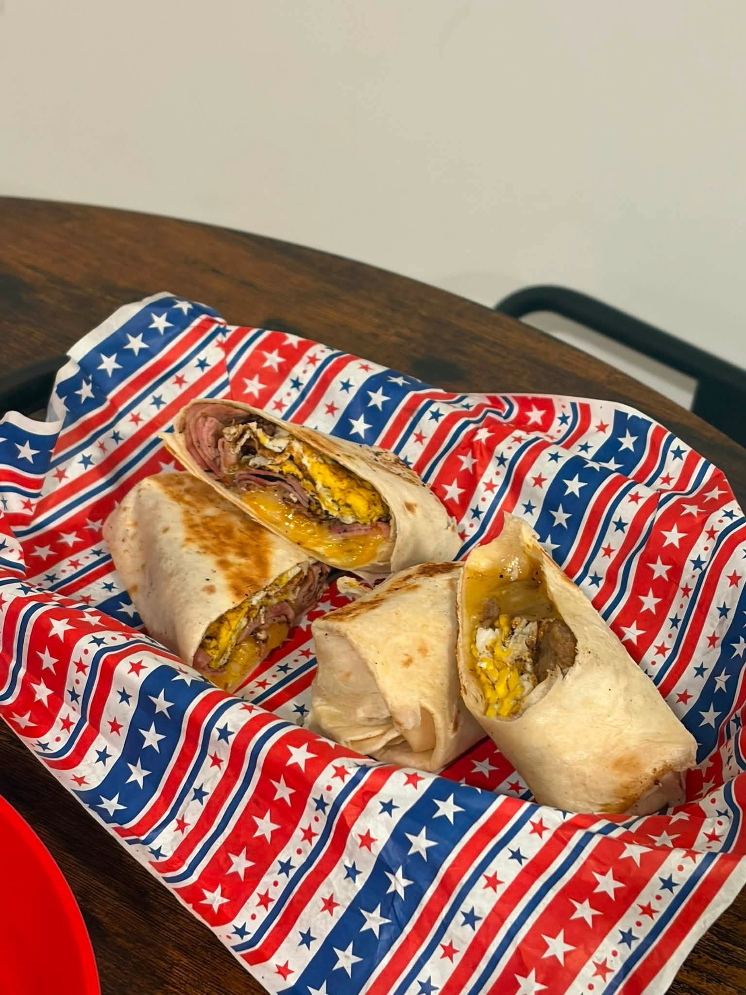 Breakfast wraps with egg and cheese on patriotic paper
